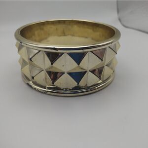 Gold toned (plastic) warrior bracelet‎